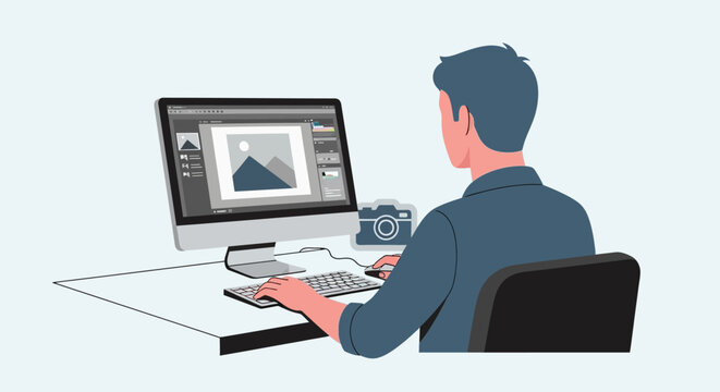 Man sitting at desk with computer.