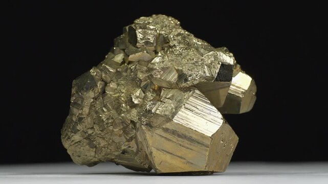 Pyrite - mineral, shiny iron sulfide in natural crystal form, also known as fools gold