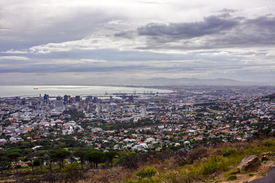 View over Cape Town and Table Bay from the slopes of Table Mountain at the base of the Cable Car at Table in South Africa.