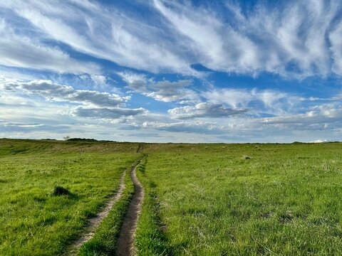 Footpath through rural grassland near Capitol Hill, Salt Lake City, Utah, USA