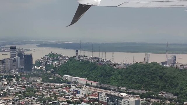 From the airplane window, the city of Guayaquil and the Guayas River are visible just minutes after ascending.
