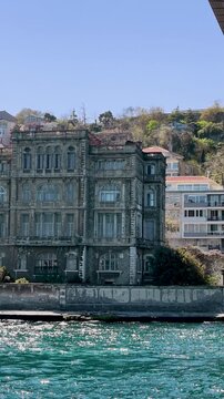 Exploring a historic building by the water in a sunny location near the coast