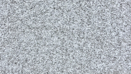Fototapeta premium intricate gray granite texture closeup with speckled quartz crystals and mineral grains on natural stone surface