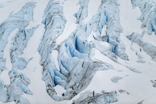 Blue rugged glacier ice with crevasses and snow, detail, Exit Glacier, Kenai Peninsula, Alaska, USA