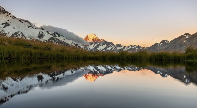 Mount Cook at sunset, reflection in mountain lake, Sealy Tarns, Hooker Valley, Mount Cook National Park, Southern Alps, Canterbury, South Island, New Zealand