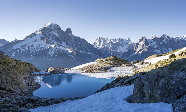 Mountain panorama with water reflection in Lac Blanc, mountain tops, Aiguille Verte, Grandes Jorasses, Aiguille du Moine, Mont Blanc, Mont Blanc massif, Chamonix-Mont-Blanc, Haute-Savoie, France