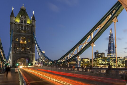 Tower Bridge in the evening, light tracks of passing cars, London, England, Great Britain