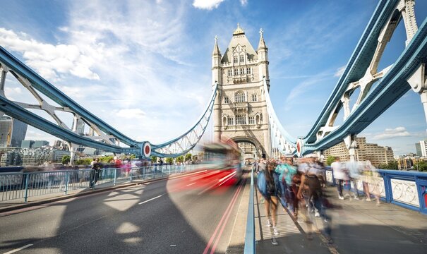 Red double-decker bus on the Tower Bridge, motion blur, Tower Bridge, London, England, Great Britain