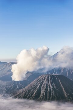Mount Bromo smoking volcano, Mount Batok, Mount Kursi, Mount Gunung Semeru, Bromo Tengger Semeru National Park, East Java, Indonesia