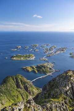 View of fishing village Henningsvaer from the top of Festv&aring;gtinden, Small islands connected by road and bridges, Austv&aring;g&oslash;ya, Lofoten, Norway