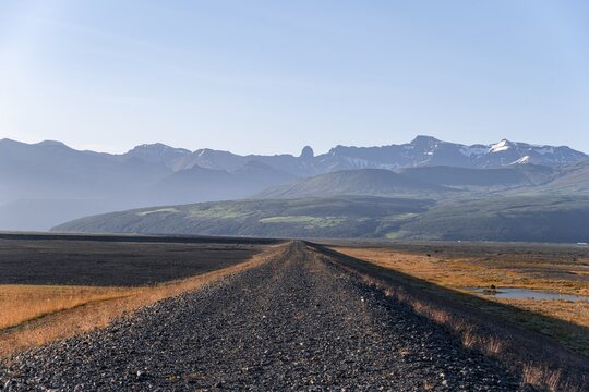 Closed gravel road, mountains and wide landscape behind, Ring Road, Iceland
