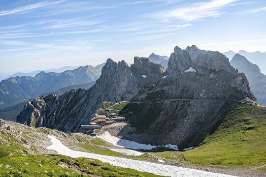 View of Karwendel mountain restaurant and Karwendelbahn with northern, middle and southern Karwendelkopf, on the right western Karwendelspitze, Mittenwalder H&ouml;henweg, Karwendel Mountains, Mittenwald, Bavaria, Germany