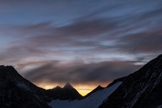 Mountain ridge at sunrise with dramatic clouds, S&ouml;lden, &Ouml;tztal, Tyrol, Austria
