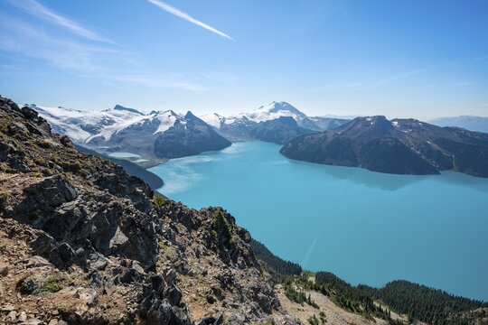 View from Panorama Ridge hiking trail, turquoise glacial Garibaldi Lake, Guard Mountain and Deception Peak, glacier behind, Garibaldi Provincial Park, British Columbia, Canada