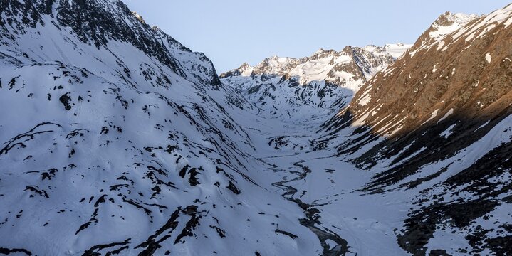 Mountain valley with river, morning atmosphere, mountains in winter, aerial view, Stubai, Tyrol, Austria