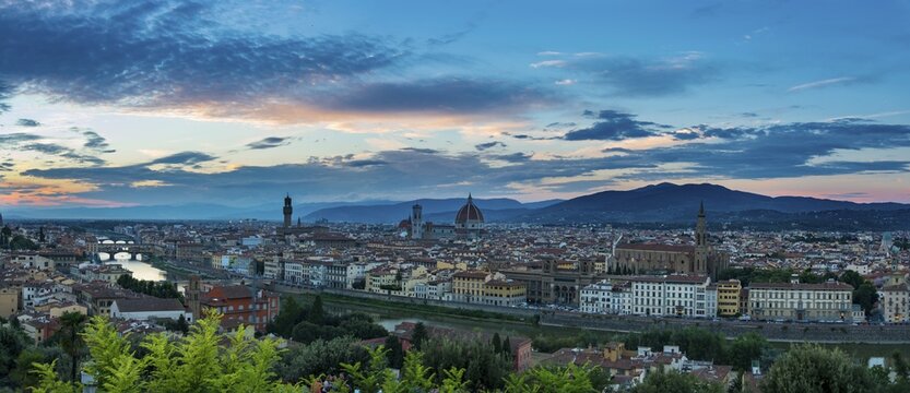 Cityscape at sunset with Cathedral, palace Palazzo Vecchio, bridge Ponte Vecchio and Basilica di Santa Croce, Florence, Tuscany, Italy