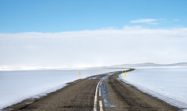 Road through snowy landscape, Route 1 between Eglstadir and Myvatn, Nor&eth;urland eystra, Northern Iceland, Iceland