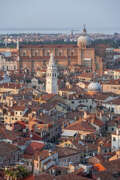View from the bell tower Campanile di San Marco on numerous churches and houses of Venice, city view of Venice, Veneto, Italy