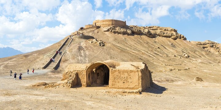 Ruins of ritual buildings in front of Dakhmeh Zoroastrian Tower of Silence, Yazd, Iran