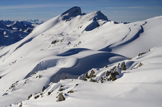 Summit of the Toreck with snow cornices and blue sky, Ritzlern, Kleinwalsertal, Vorarlberg, Austria