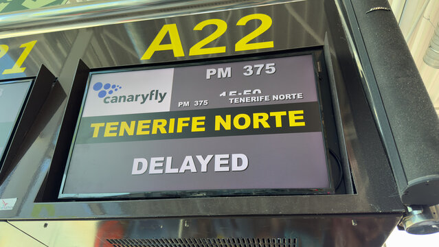 April 9th, 2026, Fuertaventura, Spain. Close view of airport gate screen with delayed flight information travel disruption concept