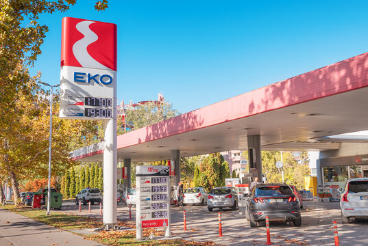 25 October 2025, Belgrade, Serbia: EKO gas station with cars refueling, displaying current fuel prices for gasoline and diesel, reflecting energy costs in the city
