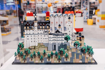 Naklejka premium 19 October 2025, Belgrade, Serbia: Neuschwanstein Castle LEGO model showcasing intricate detail, creativity, and the joy of constructing iconic landmarks from miniature bricks