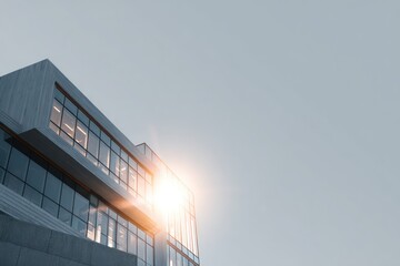 Obraz premium Sunlight reflecting on modern glass building