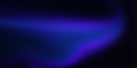 Abstract grainy gradient background featuring deep blue and violet light leaks across dark textured cosmic aesthetic design. © Rk