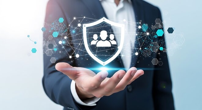 Person holding digital shield with people icon over futuristic background