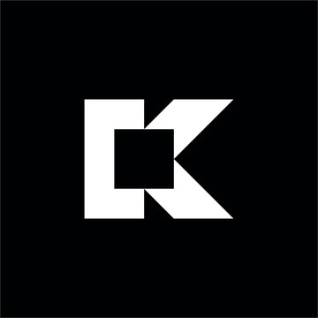 A futuristic logo that combines the letters K and C into a sharp geometric mark for a modern technology brand identity.