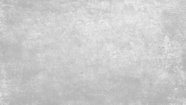 Gray textured concrete wall surface with scratches and imperfections