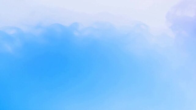 Blurry blue silhouette against soft gradient
