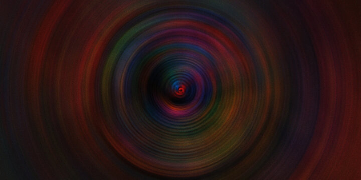 Circular motion blur background featuring a rainbow spectrum of colors spiraling into a central dark focal point with grain.
