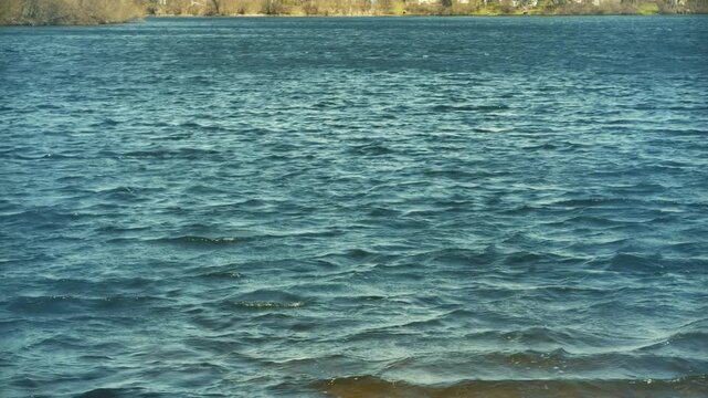 Water Surface With Small Ripples and Waves on River. Freshwater Reservoir
