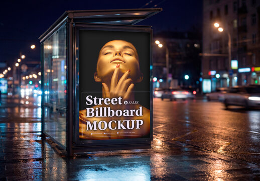 Glass bus shelter advertising lightbox mockup on rainy street at night