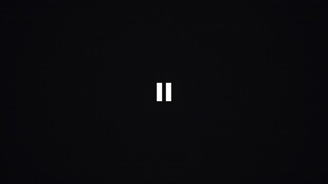 Black screen with a white pause symbol indicating a pause in video playback or a temporary stop in a process or activity