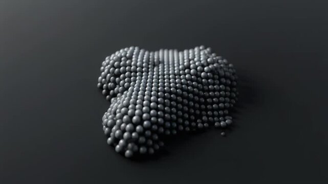 gray balls forming pyramid shape on dark background