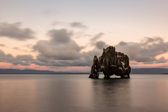 Rock formation in the middle of the water, Hvitserkur, Northern Iceland, long exposure motion blur