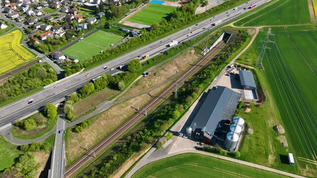 Idstein, Germany - April 23, 2026: Aerial view of German highway A3 and high speed train track between Bad Camberg and Idstein. 