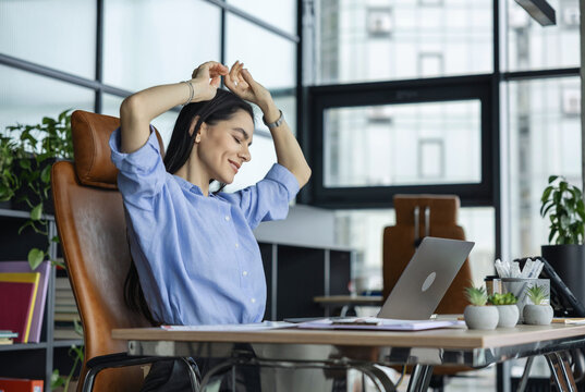 Relax after long working. Business success. Businesswoman boss in business office. Woman office manager. Woman CEO or secretary assistant. Businesswoman boss with laptop in office. Professional woman