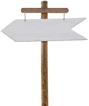 A road sign in the form of a white wooden arrow