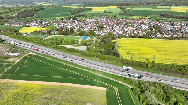 Idstein, Germany - April 23, 2026: Aerial view of dense traffic on German highway A3 between Bad Camberg and Idstein.