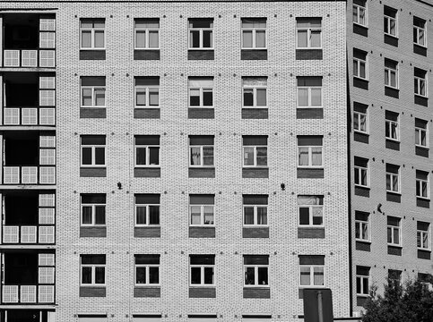 Black and white multiple rows of windows architecture background