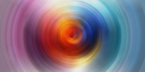 Obraz premium Vibrant colorful radial gradient swirl pattern creating illusion of circular movement with light flares in central point.