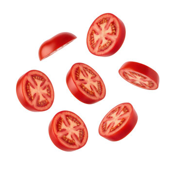 Sliced red tomato pieces floating in mid-air isolated on a transparent background