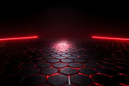 Abstract image of dark futuristic hexagon patterned floor illuminated by bright red neon light lines creating a vibrant glow and dynamic background