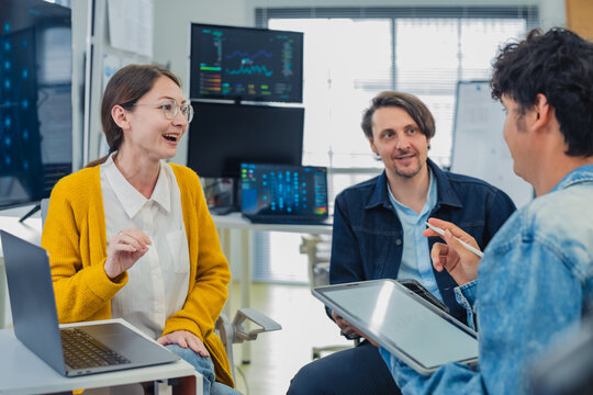 Professional Female Specialist Explaining Advanced AI Neural Network Data to Tech Team in Modern Office