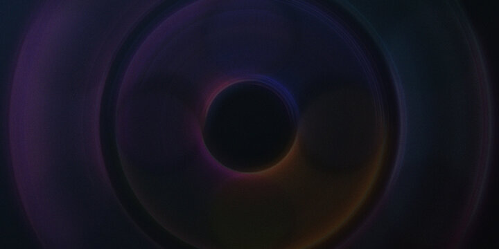 Abstract dark background with multiple light circles creating a tunnel effect and an illusion of depth with vibrant colors.