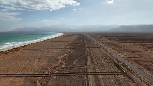 Aerial coastal road in arid landscape. Sokotra, Yemen.